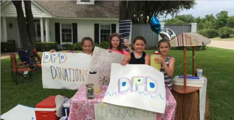 Girls raise a staggering $10000 for victims of the Dallas shooting with lemonade stand