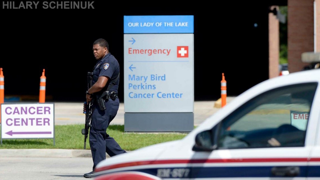 Guard outside Our Lady of the Lake Medical Center in Baton Rouge