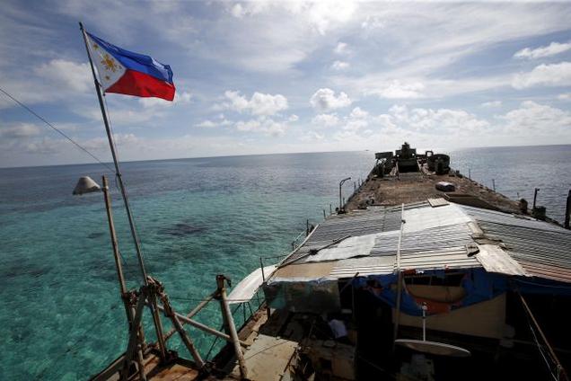 A Philippine flag flutters from BRP Sierra Madre a dilapidated Philippine Navy ship that has been aground since 1999 and became a Philippine military detachment on the disputed Second Thomas Shoal part of the Spratly Islands in the South China Sea. Fil