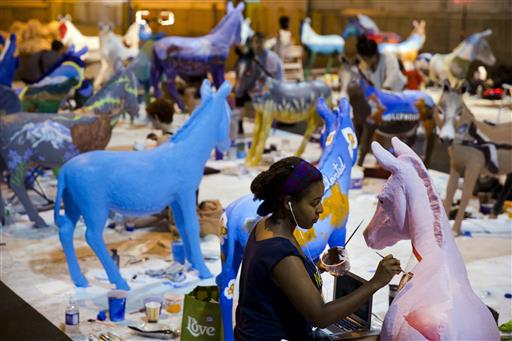 Environmental activists have made an unconventional addition to some of the fiberglass donkeys positioned around Philadelphia ahead of the Democratic National Convention