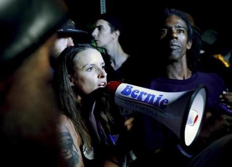 Demonstrators yell during protest at Franklin Delano Roosevelt park in Philadelphia Thursday