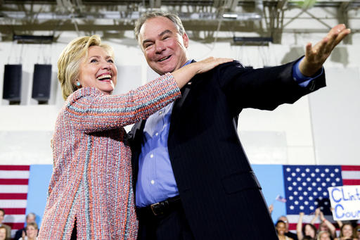 Democratic presidential candidate Hillary Clinton accompanied by Sen. Tim Kaine D-Va. speaks at a rally at Northern Virginia Community College in Annandale Va. Clinton has chosen Kaine to be her running mate (AP Phot