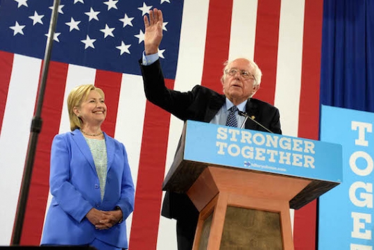 Bernie Sanders introducing presumptive Democratic presidential nominee Hillary Clinton at a rally in Portsmouth New Hampshire