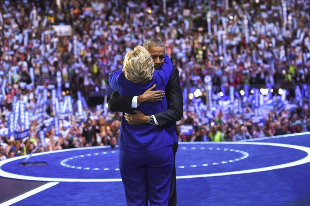 Hillary Clinton hugs President Barack Obama at 2016 DNC in Philadelphia