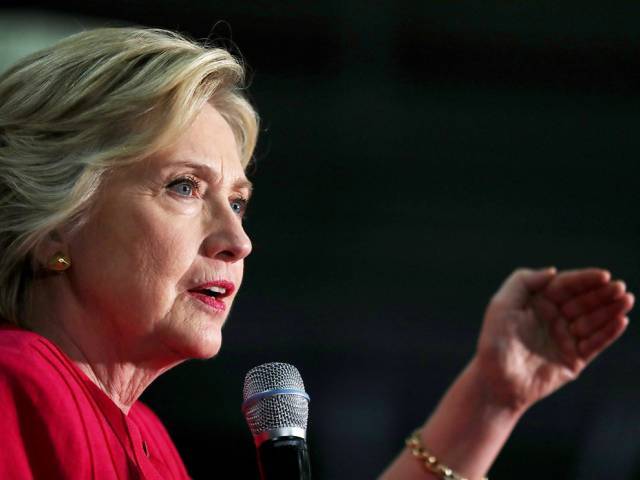 Democratic presidential nominee former Secretary of State Hillary Clinton speaks during a campaign rally with democratic vice presidential nominee US Sen Tim Kaine at K'Nex a toy company