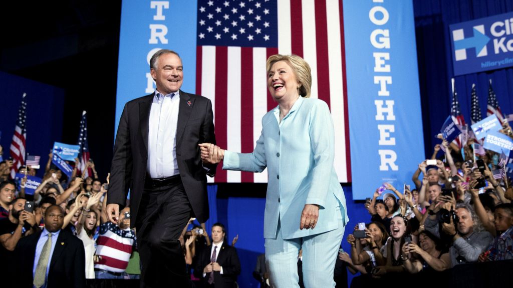 Democratic presidential candidate Hillary Clinton and running mate Sen. Tim Kaine D-Virginia take the stage together at a rally at Florida International University Panther Arena in Miami Saturday