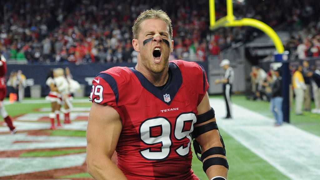 Houston Texans defensive end J.J. Watt takes the field before an NFL football game against the New England Patriots in Houston. Watt is expected to start camp at full strength after spending much of the offs