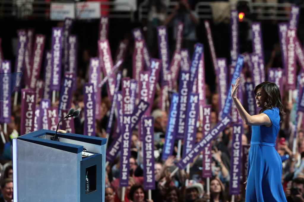 First lady Michelle Obama acknowledges the crowd after delivering remarks on the first day of the Democratic National Convention at the Wells Fargo Center