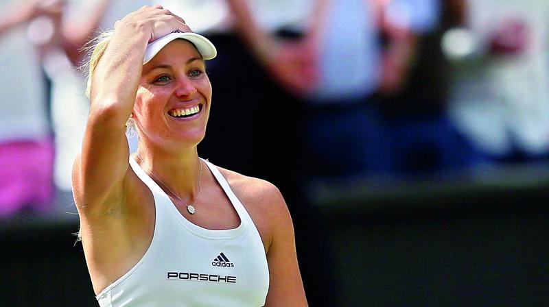 Angelique Kerber of Germany celebrates her 6-4 6-4 victory over Venus Williams in the women’s singles semifinals at Wimbledon in London on Thursday