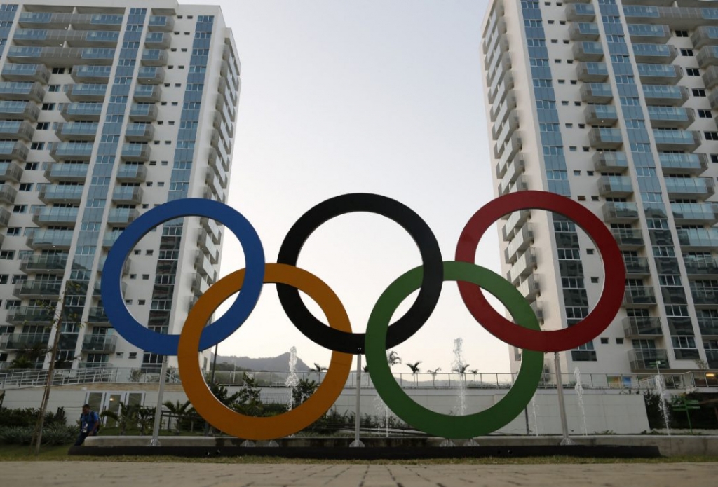 The Olympic rings adorn the Athletes Village in Rio. While some countries refuse to stay there Canada's athletes have begun moving