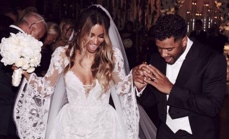 Image Text
 CASTLE WEDDING Ciara and husband Russell Wilson on their wedding day