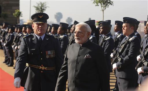 Indian Prime Minister Narendra Modi center inspects a guard of honor at an arrival ceremony at the Union Buildings in Pretoria South Africa Friday