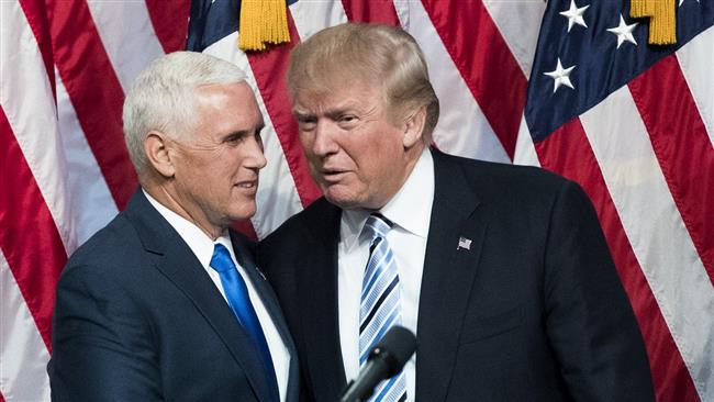 Newly selected vice presidential running mate Mike Pence and Governor of Indiana, stands with presumptive Republican presidential nominee Donald Trump during an event at the Hilton Midtown Hotel in New York City