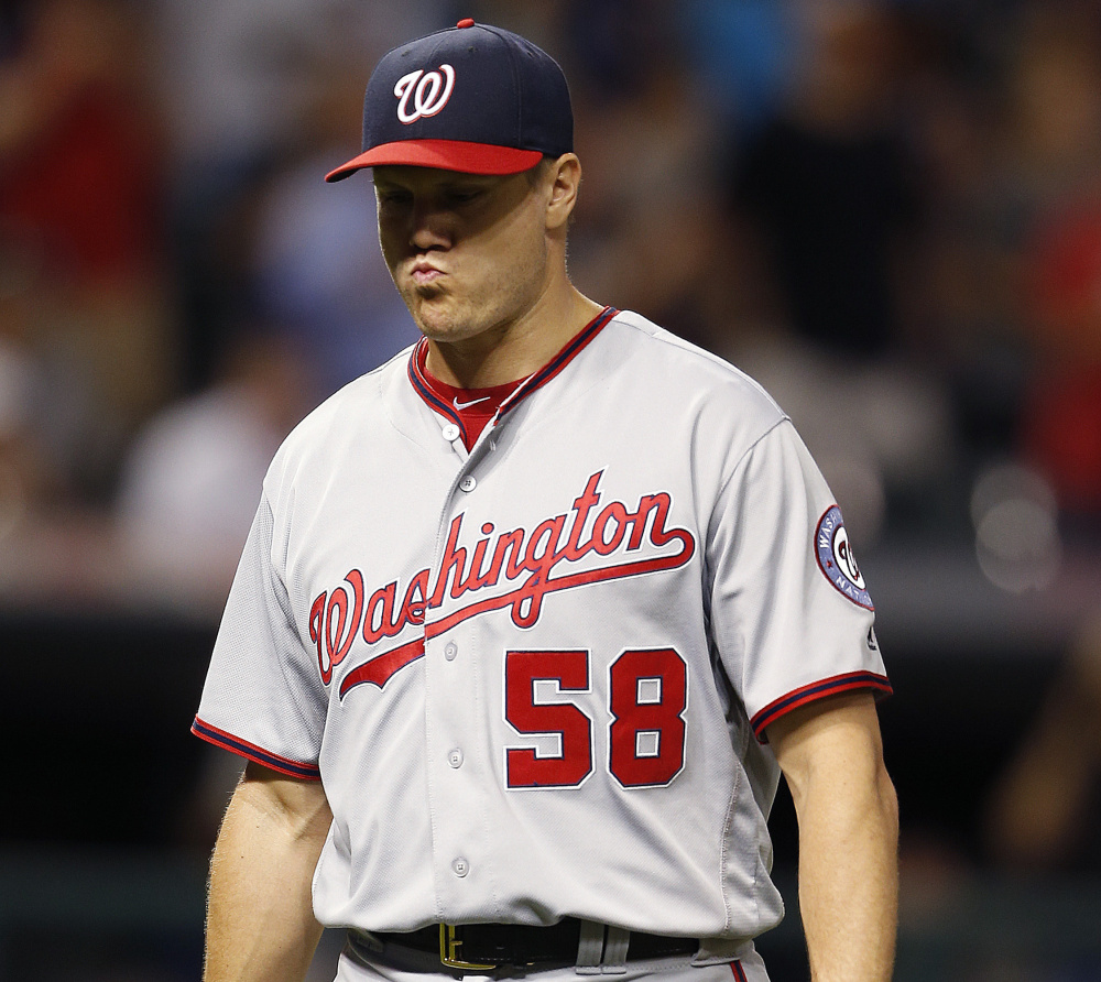 Jonathan Papelbon of the Washington Nationals was pulled Tuesday night after failing to get an out during Cleveland's winning three-run ninth inning