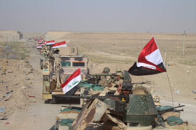 Iraqi government forces are seen near the Falahat village west of Fallujah