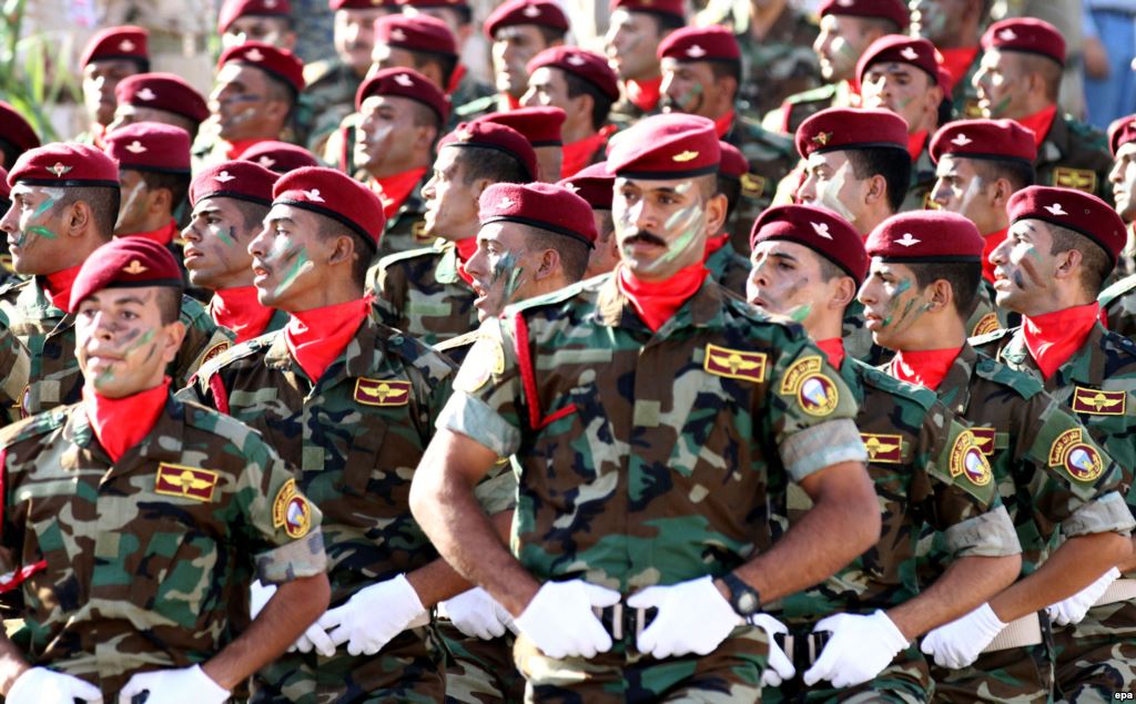 Iraqi military soldiers parade during a ceremony marking victories over Islamic state group in central Baghdad Iraq 14 July 2016