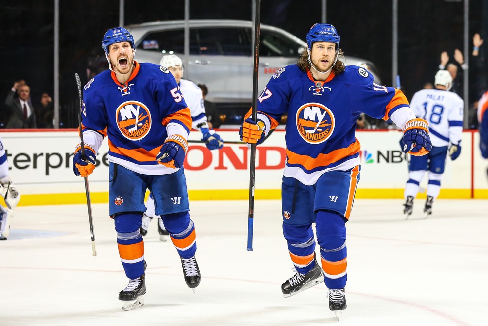 03 MAY 2016 New York Islanders center Casey Cizikas and New York Islanders left wing Matt Martin turn to congratulate New York Islanders defenseman Nick Leddy  after scoring during the second period of Game 3 of the second roun