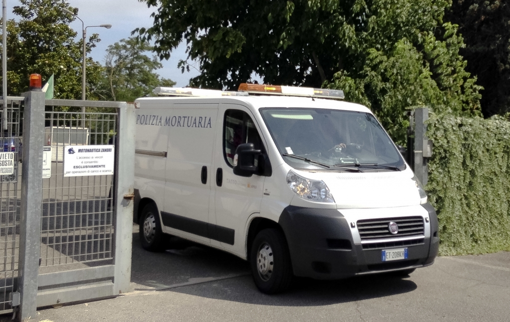 A van leaves for the morgue with the body of a young man who was found along the banks of the Tiber river in Rome Monday. Italian authorities on Monday were investigating the disappearance of a Wisconsin student in Rome a day after he arrived in the Itali