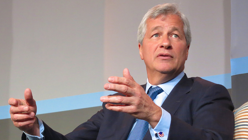 JPMorgan CEO Jamie Dimon said the banking giant will hike pay for some 18,000 low-end workers