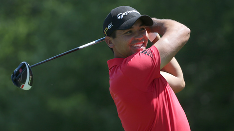 Jason Day smiles as he warms up during a practice round for the PGA Championship