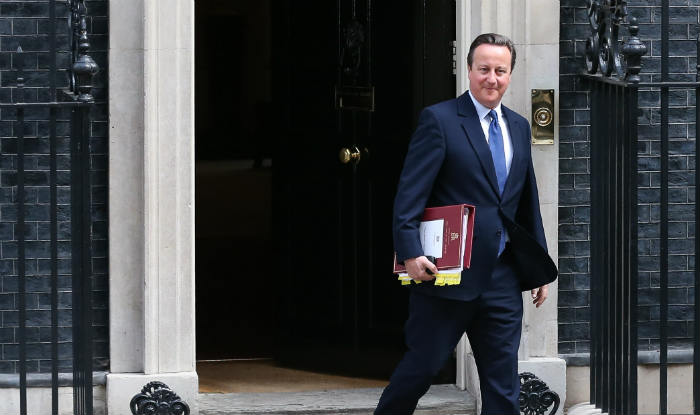 David Cameron hums cheerfully to himself after announcing that Theresa May will be new PM