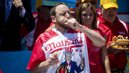 Joey Chestnut competes in the annual Hot Dog Eating Contest at Coney Island