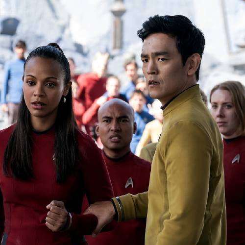 Zoe Saldana left as Uhura and John Cho as Sulu appear in a scene from'Star Trek Beyond. The movie releases in the