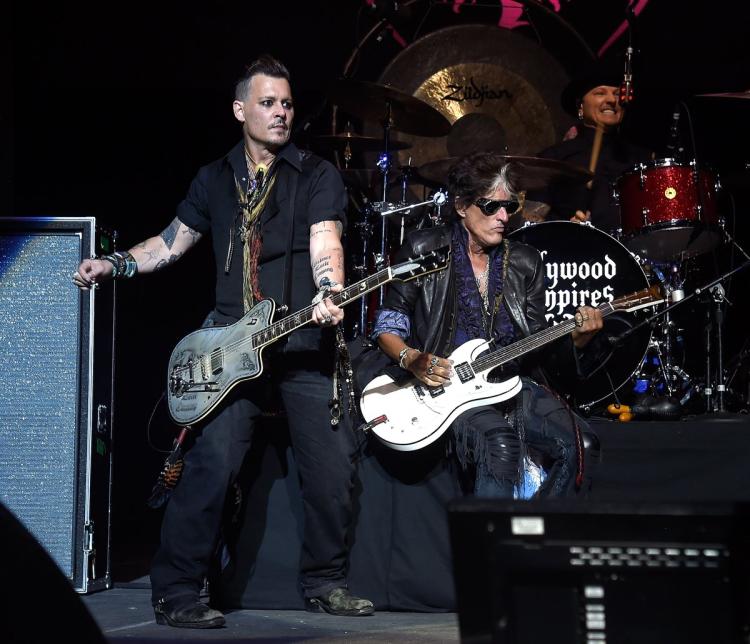 Joe Perry of Hollywood Vampires struggled before leaving the stage at Ford Ampitheater at Coney Island Boardwalk to receive treatment from EMTs Sunday night