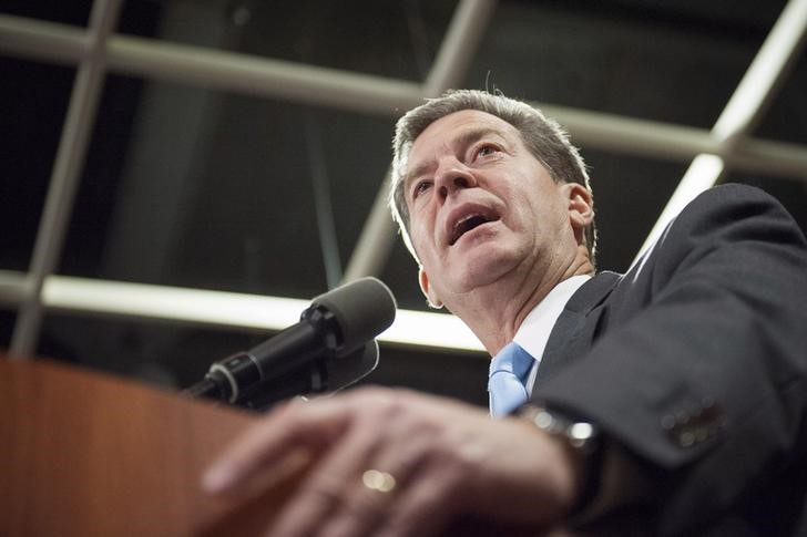 Republican Kansas Governor Sam Brownback speaks to supporters after winning re election in the U S midterm elections in Topeka Kansas November 4 2014 REUTERS Mark Kauzlarich