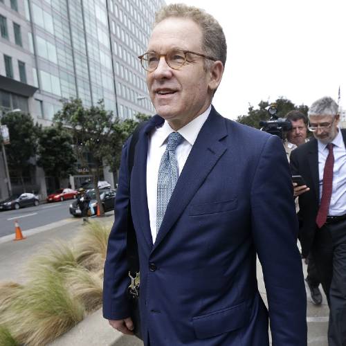 Robert Giuffra an attorney for Volkswagen leaves the Phillip Burton Federal Building after a court hearing in San Francisco. A $15 billion settlement over Volkswagen's diesel emissions cheating sca