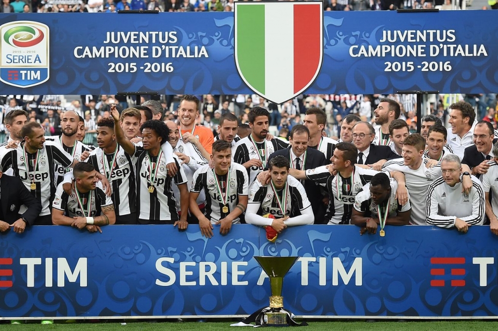 Juventus FC players celebrate winning a fifth Scudetto in a row