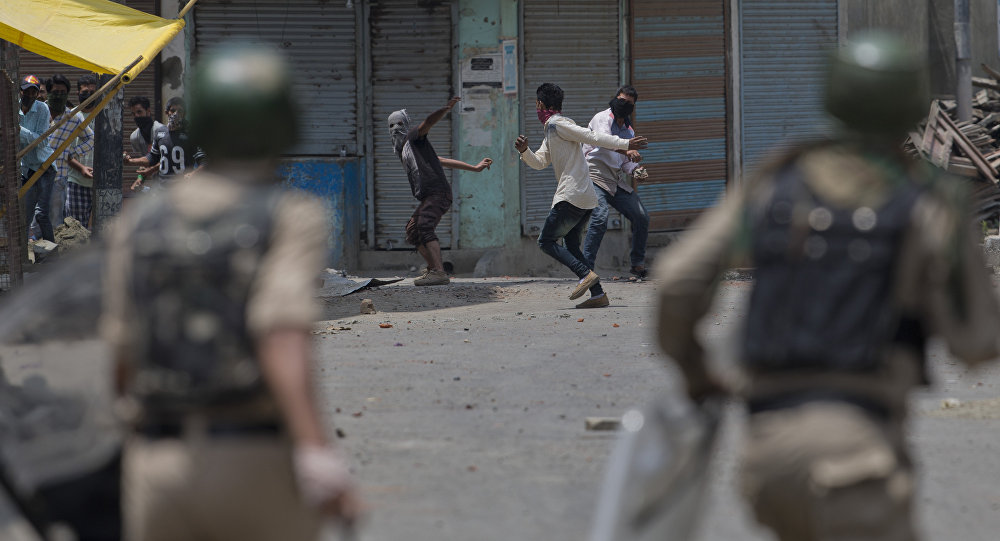 Kashmiri Muslim protesters throw bricks and rocks at Indian paramilitary soldiers in Srinagar Indian controlled Kashmir Sunday