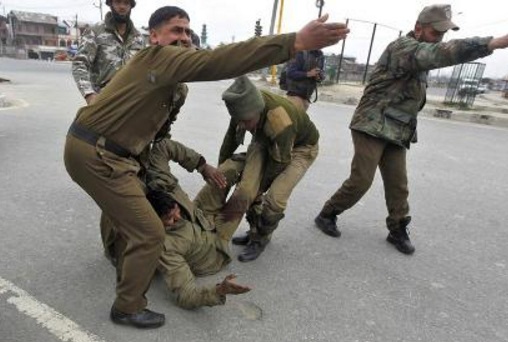 Jammu Indian army soldiers take position during an attack by militants at Janglote village of Kautha district in Jammu and Kashmir on Friday. PTI