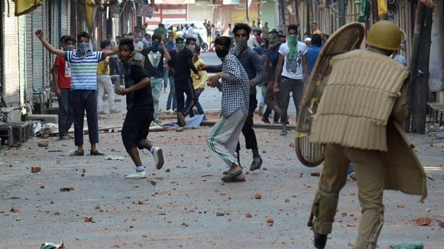 Kashmir unrest Two weeks since violent clashes Home Minister Rajnath Singh to visit valley