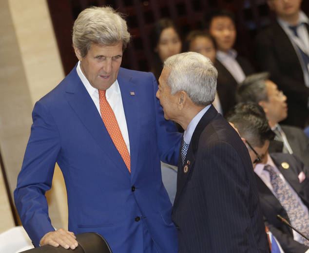 U.S. Secretary of State John Kerry left talks to Philippine Foreign Secretary Perfecto Yasay Jr. before the Association of Southeast Asian Nations