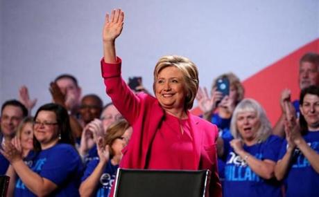 Democratic presidential candidate Hillary Clinton waves to supporters after speaking at the National Education Associationâ€™s 95th Representative Assembly in Washington