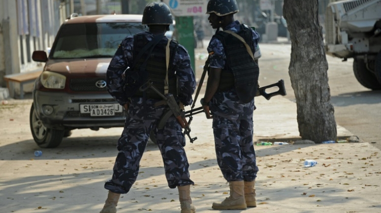 Security forces stand guard