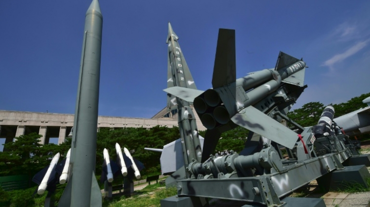 Replicas of a North Korean Scud-B missile and South Korean Nike missiles at Seoul's Korean War Memorial