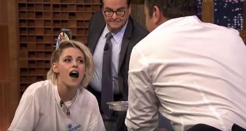 Kristen Stewart tries to swallow her second Jell-O shot during a game of Twister with Jimmy Fallon     NBC