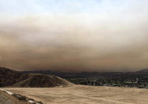 New life, new destruction for Southern California wildfire