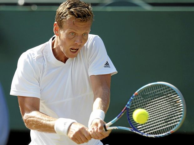 CZECH MATE Tomas Berdych of the Czech Republic returns to Lucas Pouille of France during their men’s singles quarter-final at Wimbledon