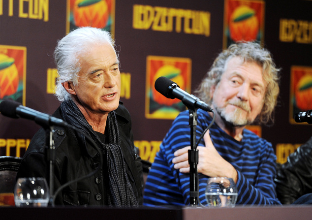 Led Zeppelin guitarist Jimmy Page left and singer Robert Plant appear at a press conference ahead of the theatrical