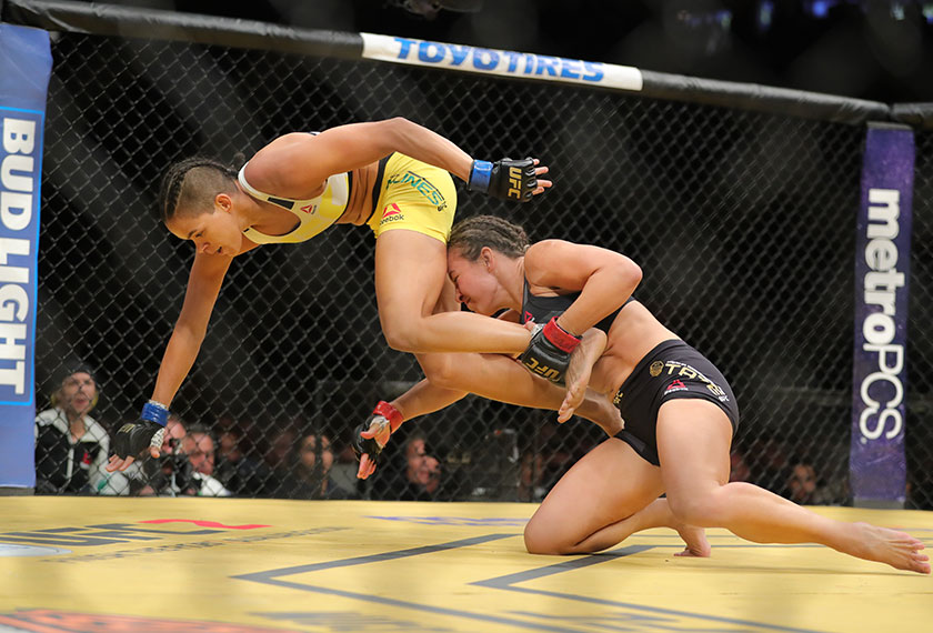 Miesha Tate looks to take down Amanda Nunes during the UFC 200 event at T Mobile Arena