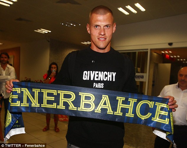 Liverpool defender Martin Skrtel has arrived in Istanbul to complete his £5million move to Fenerbahce