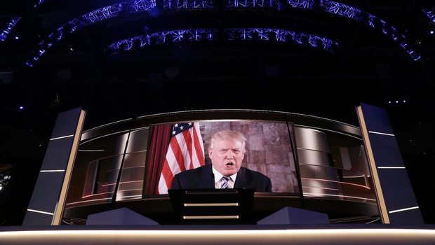 Republican Presidential Candidate Donald Trump addresses the delegates by video during the second day of the Republican National Convention in Cleveland