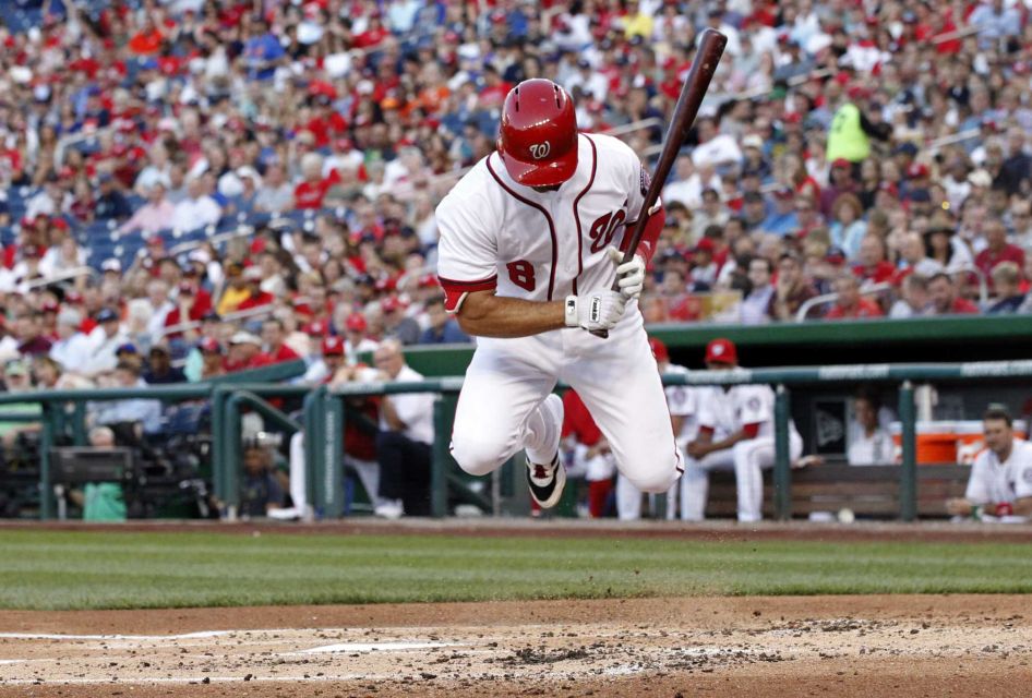 Washington Nationals Danny Espinosa jumps over an inside