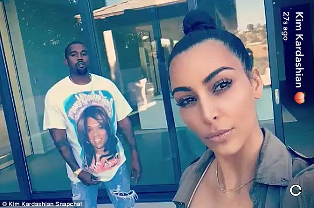 Lurker Kanye stayed uncharacteristically quiet throughout standing broodily silent in the background at one stage in one of Kim's selfies