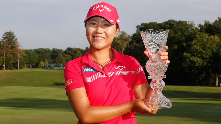 Lydia Ko celebrates with the Marathon Classic trophy