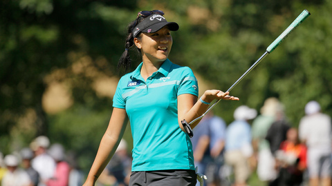 Lydia Ko of New Zealand walks off the sixth green after making a birdie during the second round of the U.S. Women's Open golf tournament