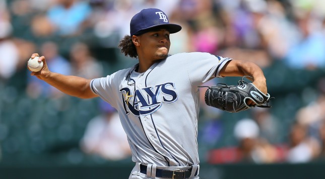 DENVER CO- JULY 20 Starting pitcher Chris Archer #22 of the Tampa Bay Rays delivers to home plate during the third inning against the Colorado Rockies at Coors Field